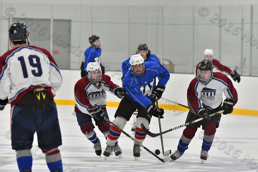 Wheaton College Men\'s Ice Hockey vs Middlesex Community College. - Photo By: KEITH NORDSTROM